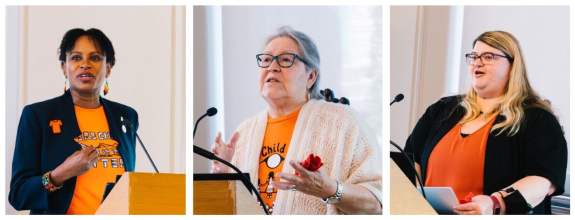 Vic U President Rhonda McEwen, Bonnie Jane Maracle and Halyna Kozar stand at the podium, speaking at a campus National Day for Truth and Reconciliation event held at Alumni Hall in Victoria College.