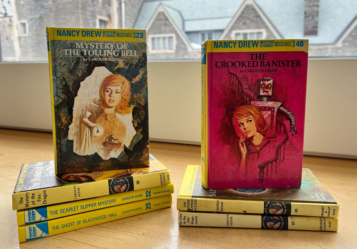 The Nancy Drew series, ghostwritten by a number of authors under the pseudonym Carolyn Keene, follows the adventures of the fictional teenage detective who solves mysteries in her hometown.