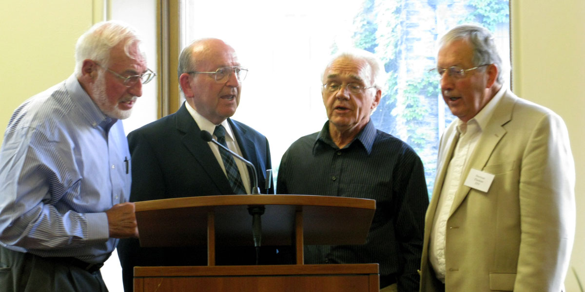 Hugh, Bob, Ron and Norm perform at their 45th Emmanuel College reunion in 2004.