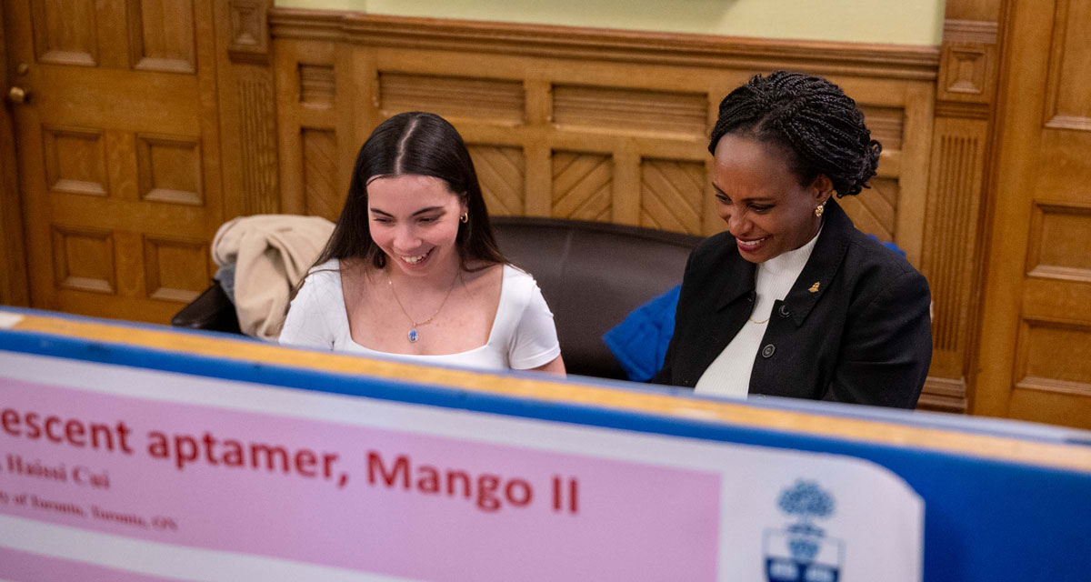 User Grace Noralco and President Rhonda McEwen at Research Day 2024.